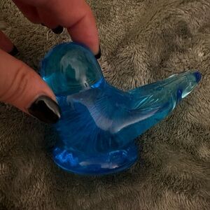 Glass blown blue bird paper weight.